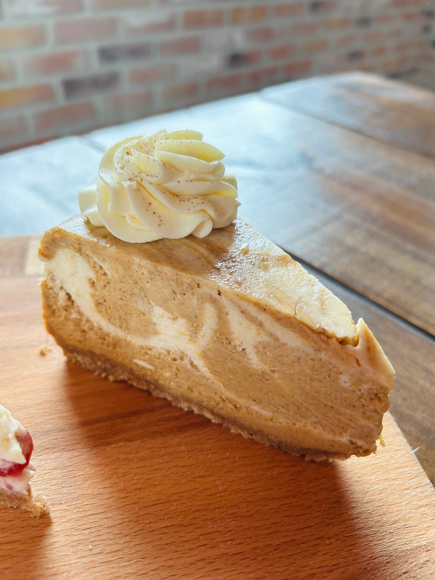 Emily’s Pumpkin Swirl Cheesecake Slice