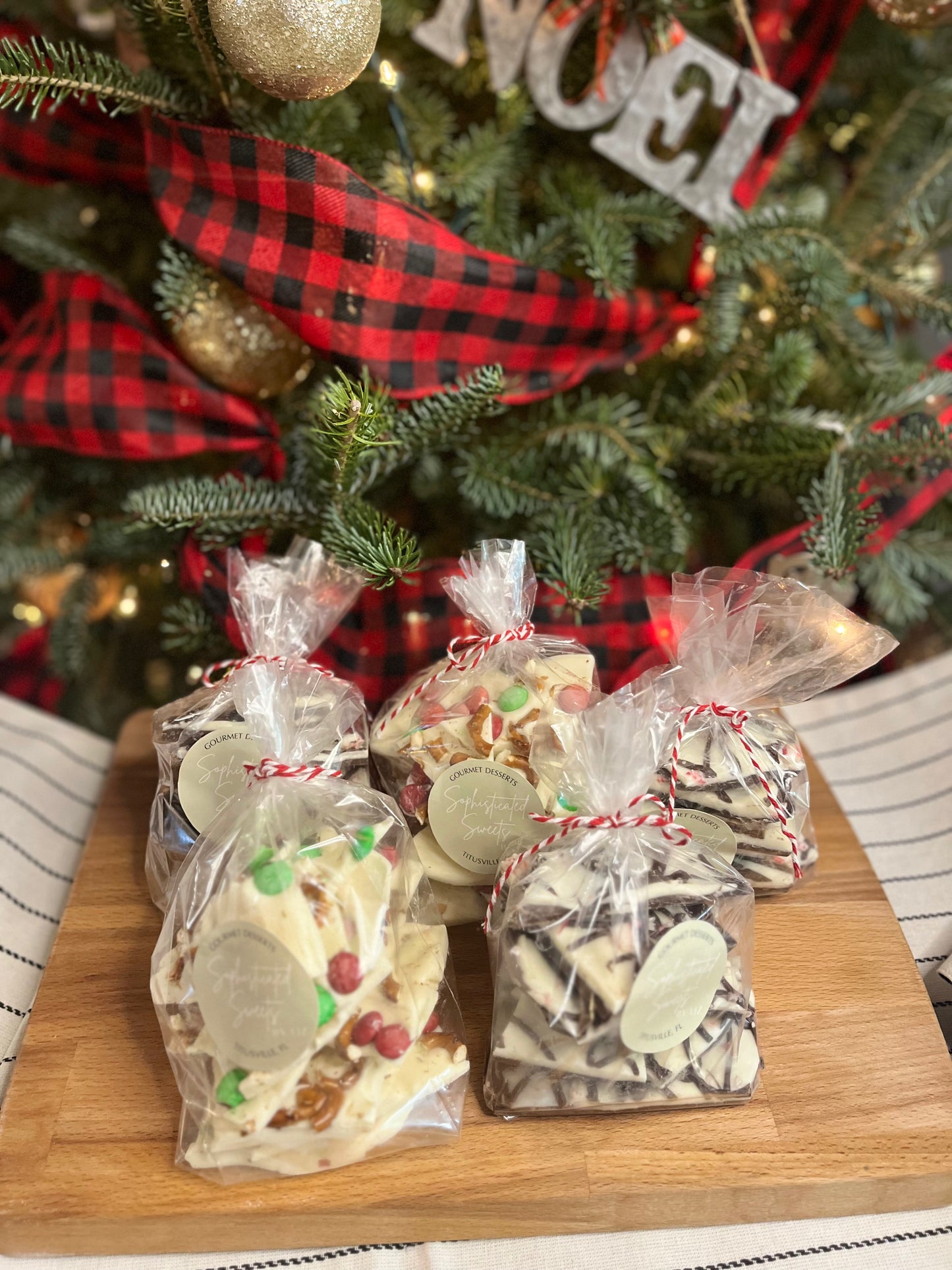 (2bags) 1 bag of each Chocolate Peppermint Bark and White Chocolate M&M and Pretzel bark in a Christmas Box
