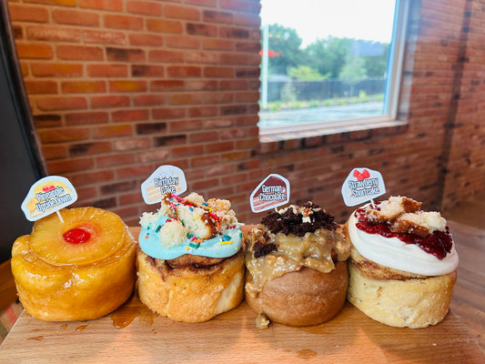 Assorted “Piece of Cake” 4 pack jumbo Cinnamon Rolls