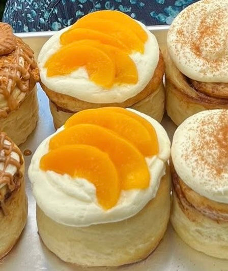 Thursday- Peaches & Cream Jumbo Cinnamon Roll- jumbo fresh baked cinnamon roll peaches and cream flavor