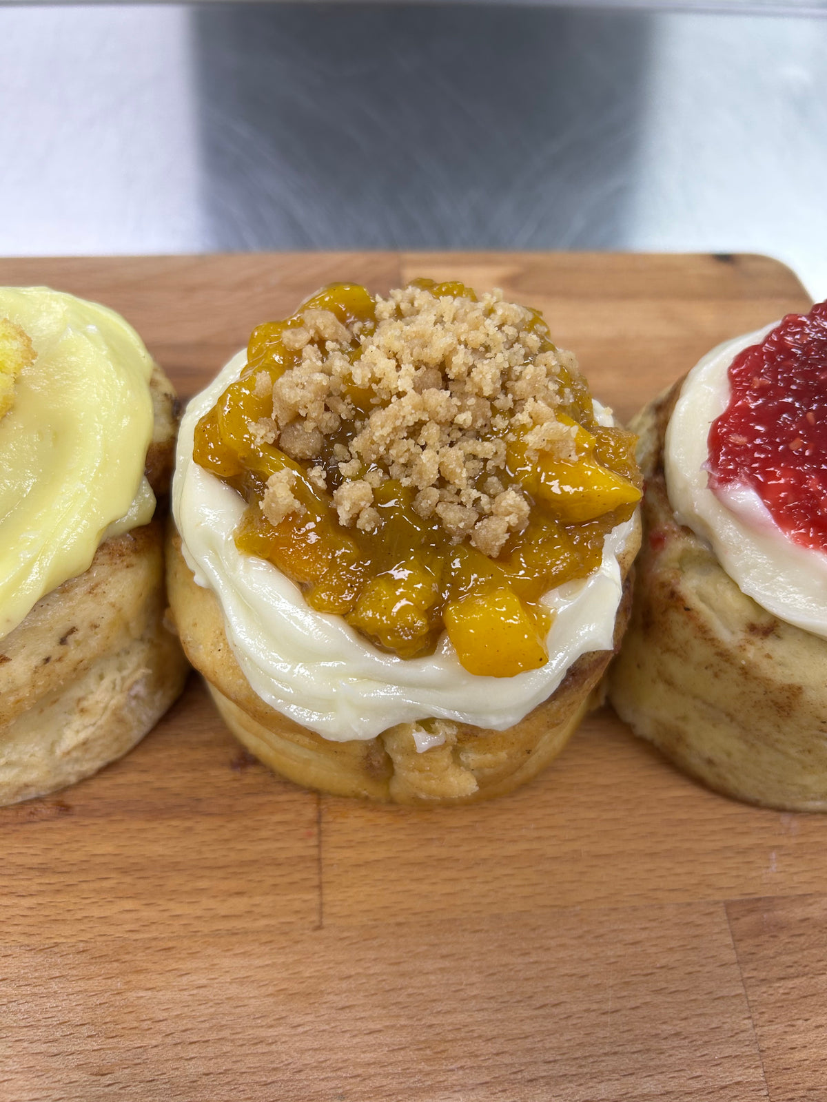 Professor Sheldon’s Peaches and Cream Cinnamon Roll