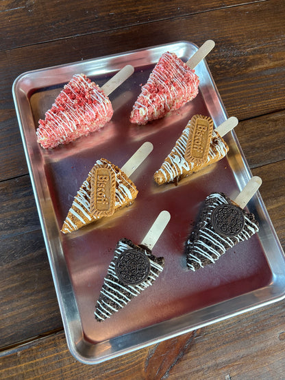 1 Large New York Style Slice Biscoff- Chocolate covered Cheesecake on a stick