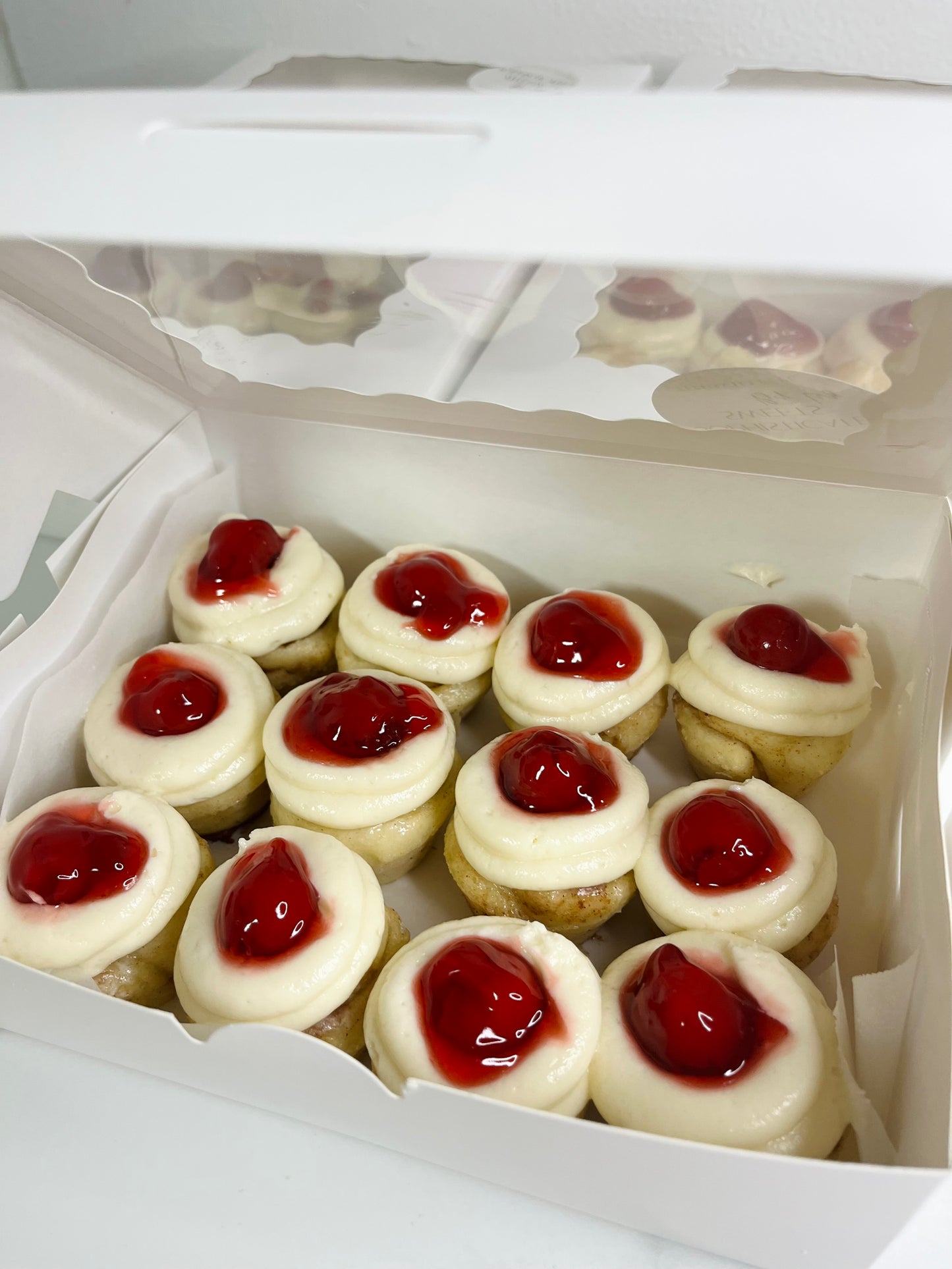 (SATURDAY ONLY) 1 dozen box of all 3  Mini Cinnamon Rolls Flavors  (Cherry Cheesecake, Peach Cobbler, Original)